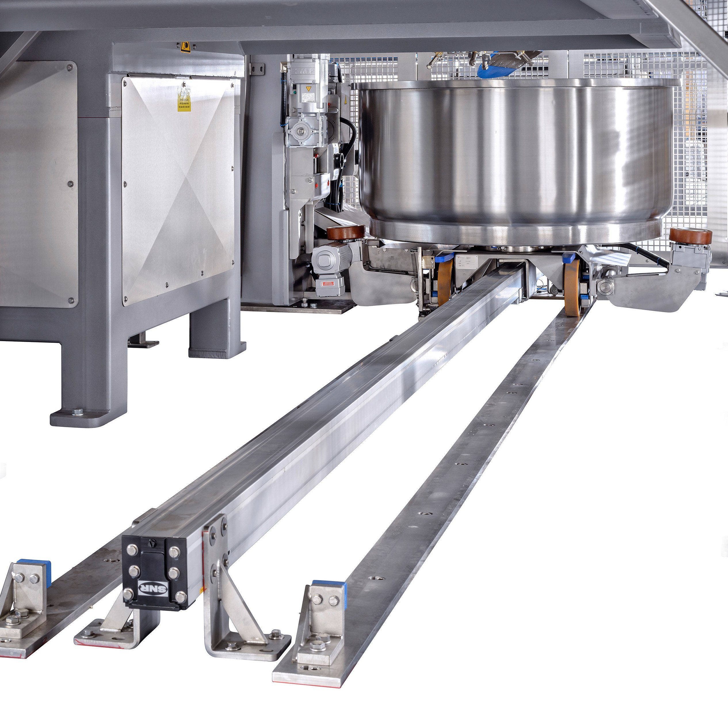 Bowl transport rail for the transportation of the bowl from the mixers to the bowl tipper
